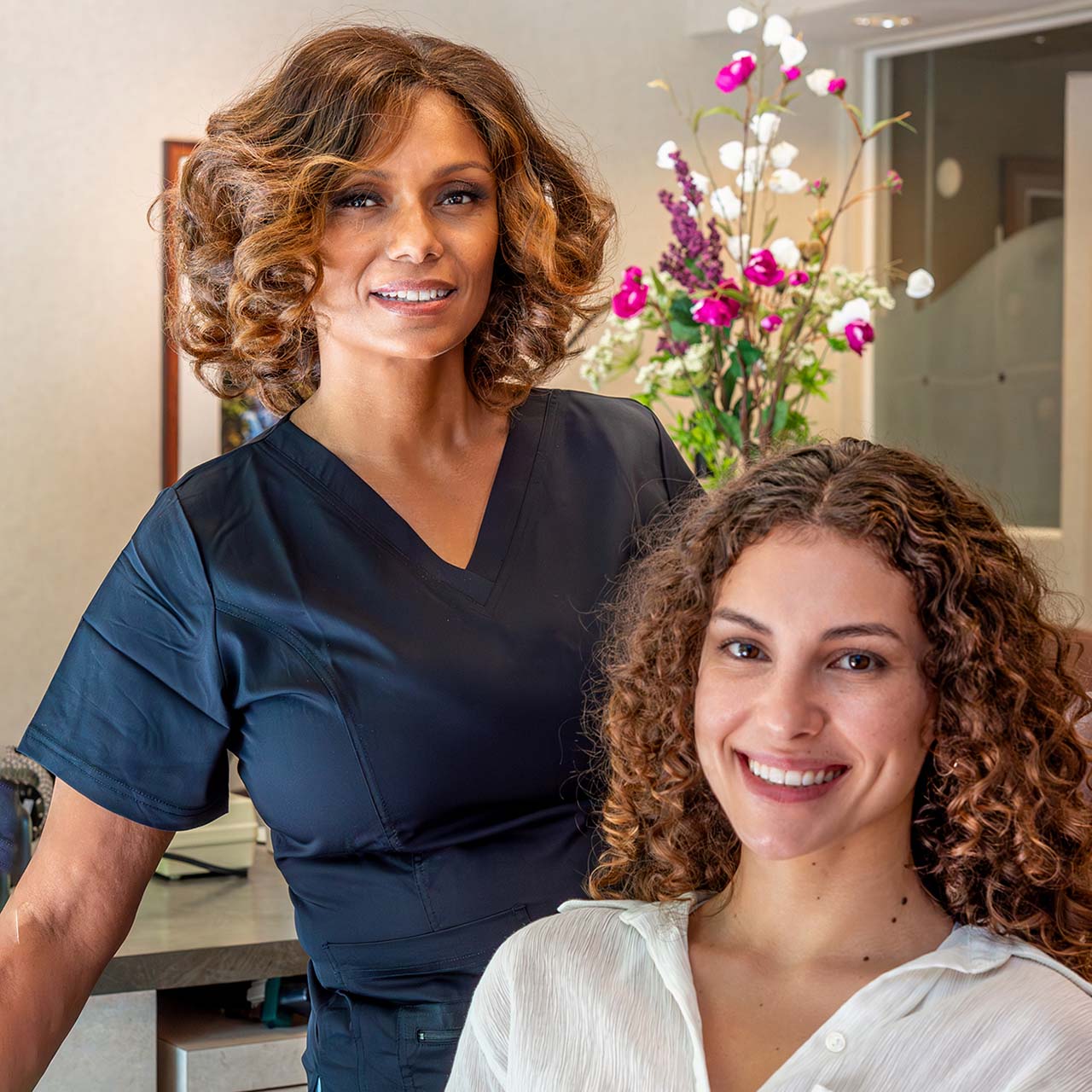 Friendly team at Kelleher Orthodontics providing a personalized Invisalign treatment consultation.