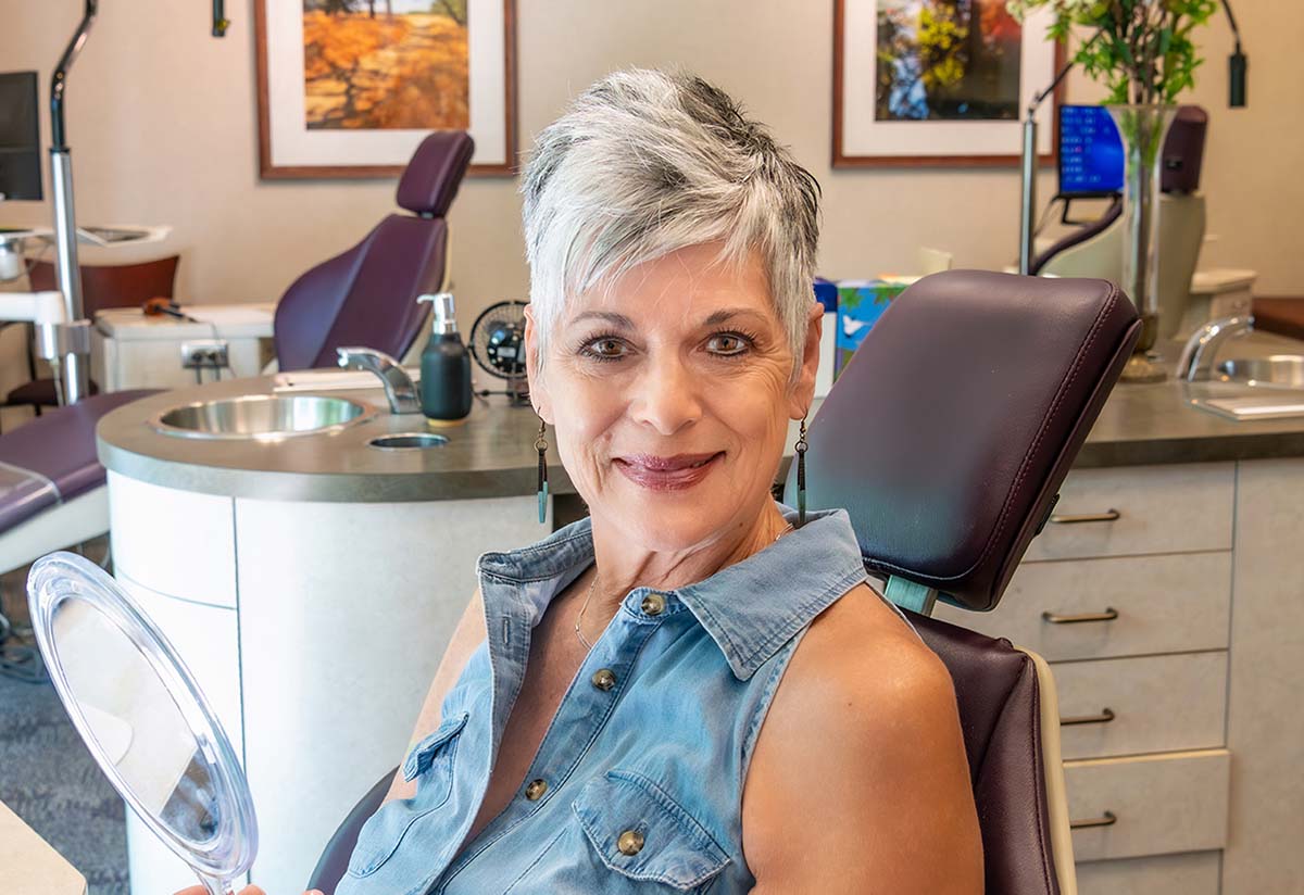 Ceramic braces on a senior patient, visually representing an orthodontic solution for those considering treatment time.